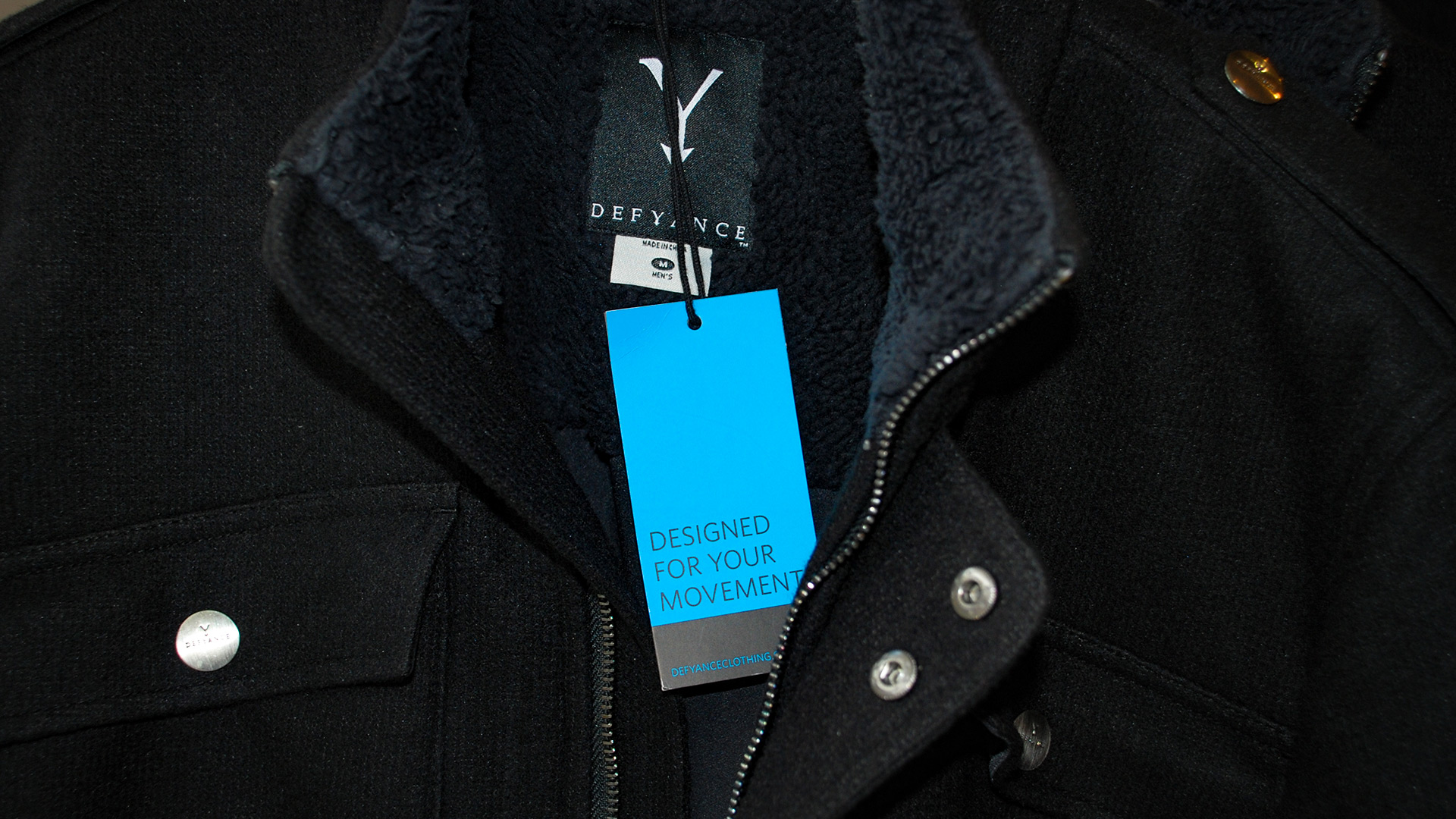 Hang tag for Defyance Clothing created by Incubate Design
