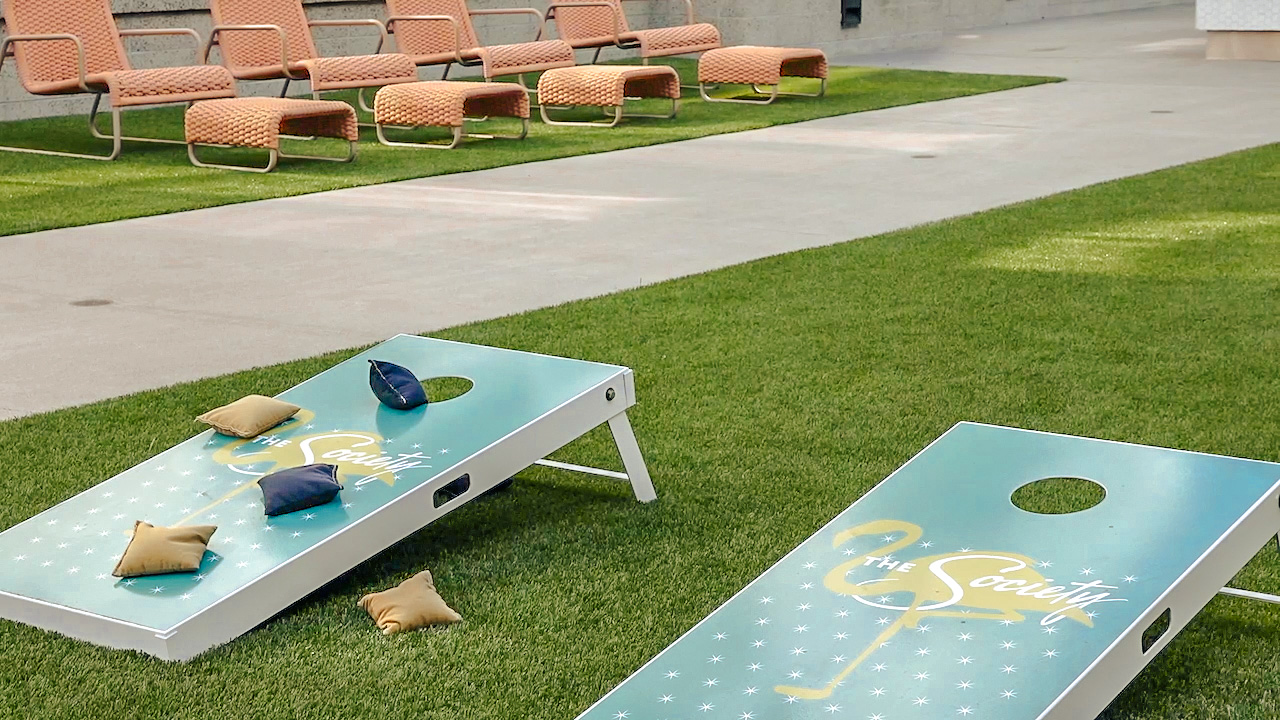 The Society apartments brand mockups of corn hole created by Incubate Design for Holland Residential